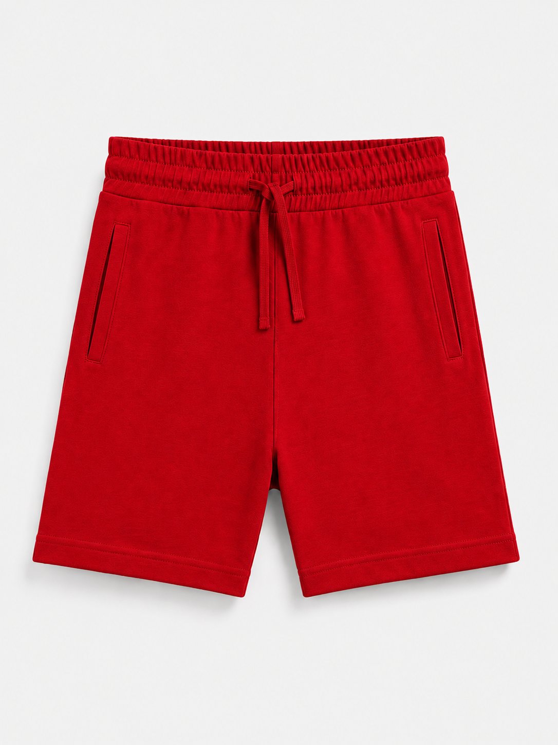Red drawstring shorts with side pockets, photographed flat against a light gray background.