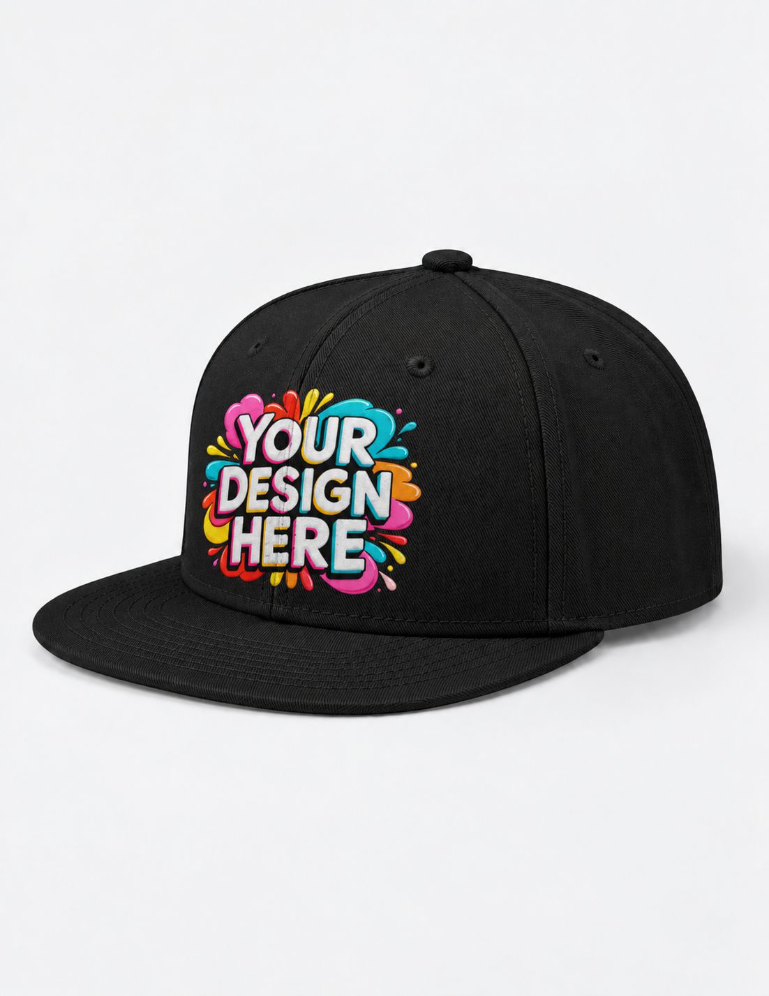 A black flat-brim snapback cap with a colorful 'YOUR DESIGN HERE' mockup graphic on the front, set against a plain light gray background.