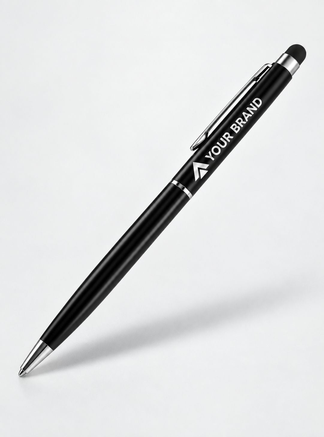 A black retractable ballpoint pen with a silver tip and silver accents, featuring a white printed placeholder logo and the text 'YOUR BRAND' on the barrel, shown on a light gray background.