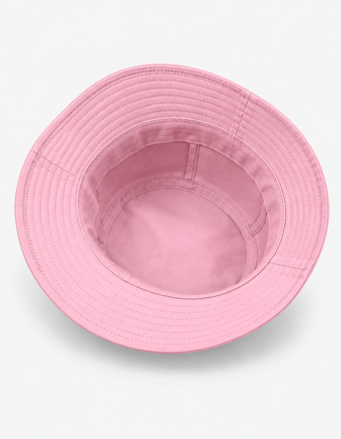 A light pink bucket hat shown from a top-down view on a clean white background.