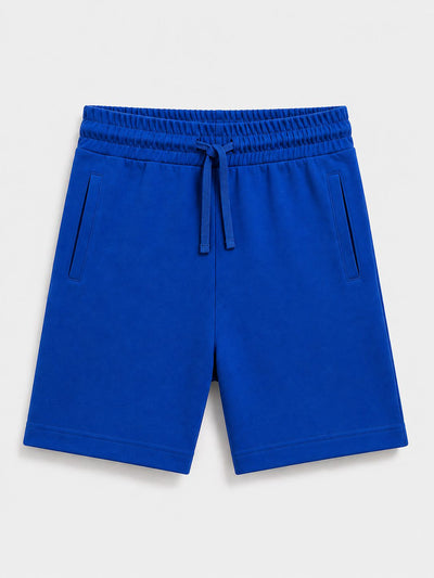 A pair of bright royal blue sweat shorts with an elastic drawstring waist and side pockets, shown flat on a light gray background.