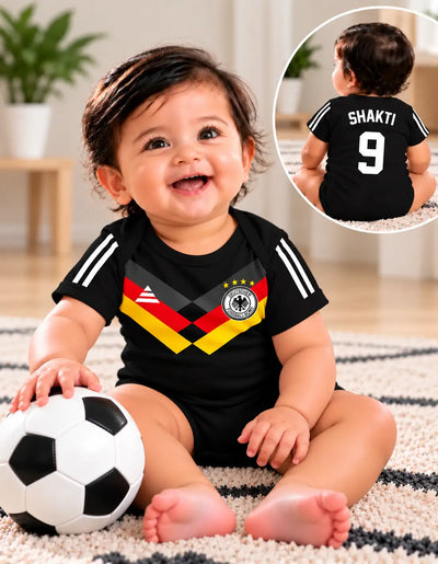 Baby boy soccer romper, black with gray sleeve stripes and colorful diamond team crest