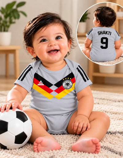 Baby boy soccer romper, light gray with black sleeve stripes and colorful diamond crest
