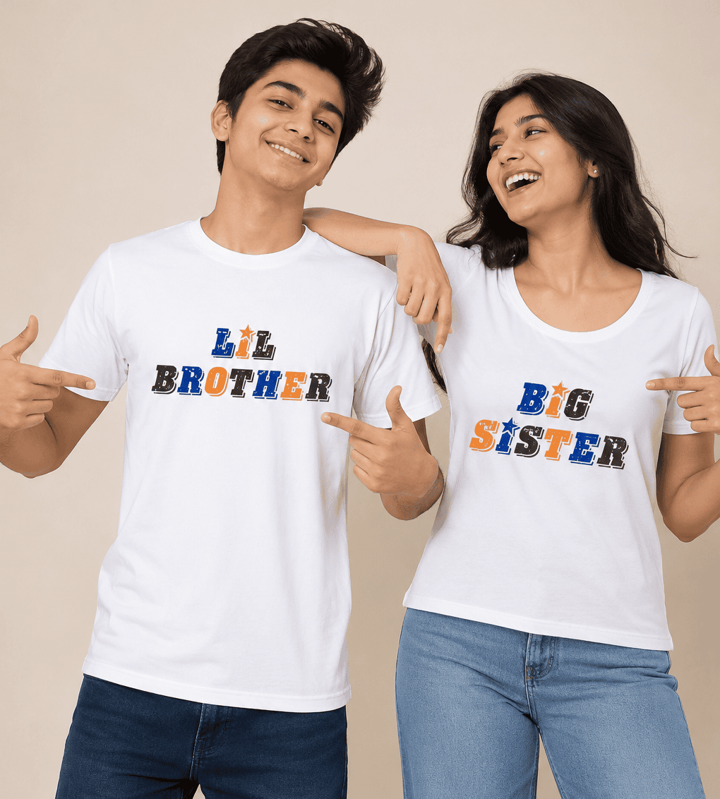 A man and a woman posing together in matching white graphic t-shirts. The man's shirt says 'LIL BROTHER' and the woman's shirt says 'BIG SISTER' in a colorful, textured font.