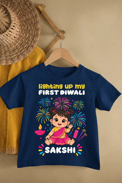 Navy baby T-shirt with a colorful Diwali fireworks and girl graphic, personalized with a name.
