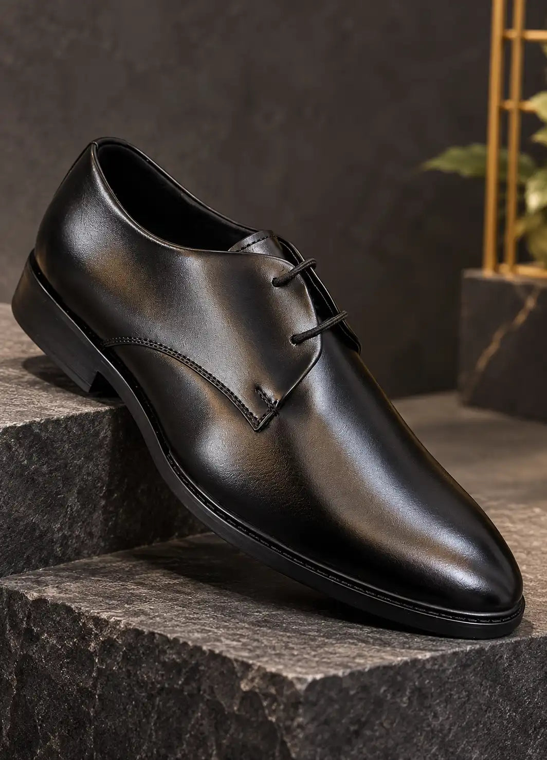 Black faux leather lace-up dress shoe with pointed toe and black sole