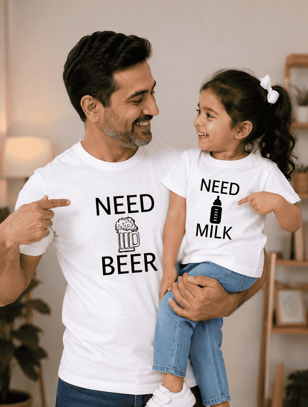 Man and child wearing matching shirts with humorous text in a home setting
