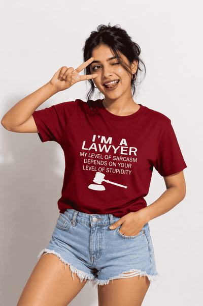 Woman wearing a red t-shirt with 'I'm a Lawyer' text and a gavel graphic, making a peace sign.