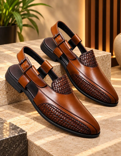 Pair of tan men's Peshawari sandals with woven panels, open heels, and adjustable buckle straps
